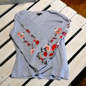 Sweater with embroidered sleeve detail